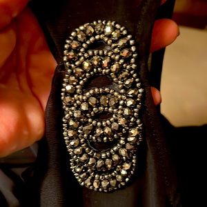 Cold shoulder Evening dress by Xscape Size 10 Black with beading on shoulders.